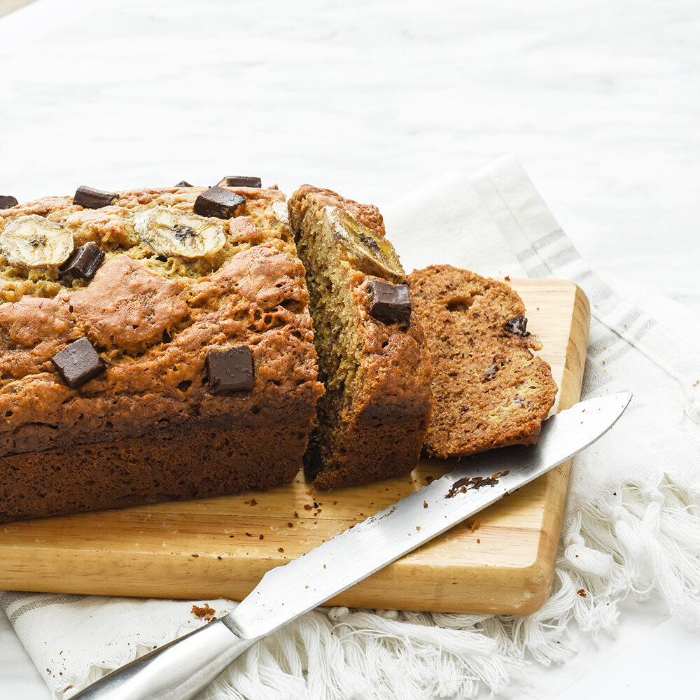 Chocolate chip banana bread on wooden board
