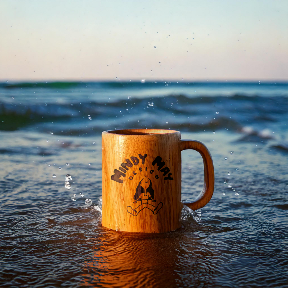 engraved-wooden-mug-on-sand