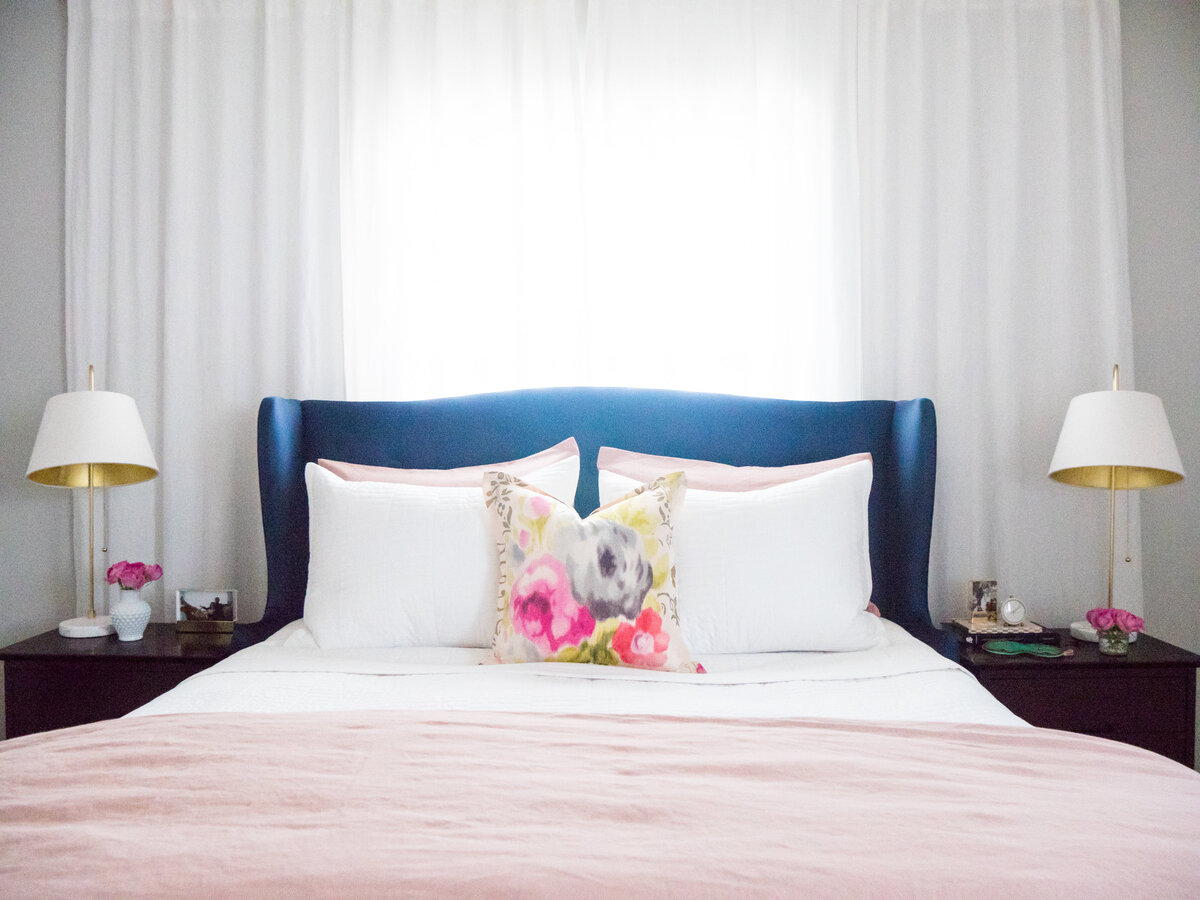Navy bed with pink bedding