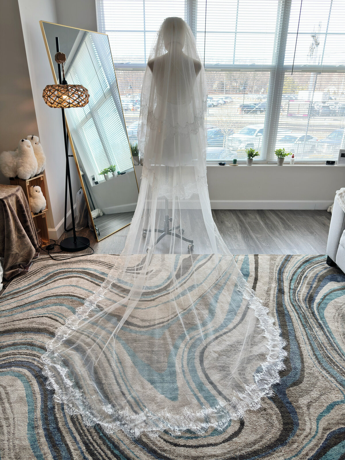 Lightweight tulle blusher veil with lace and pearl highlights
