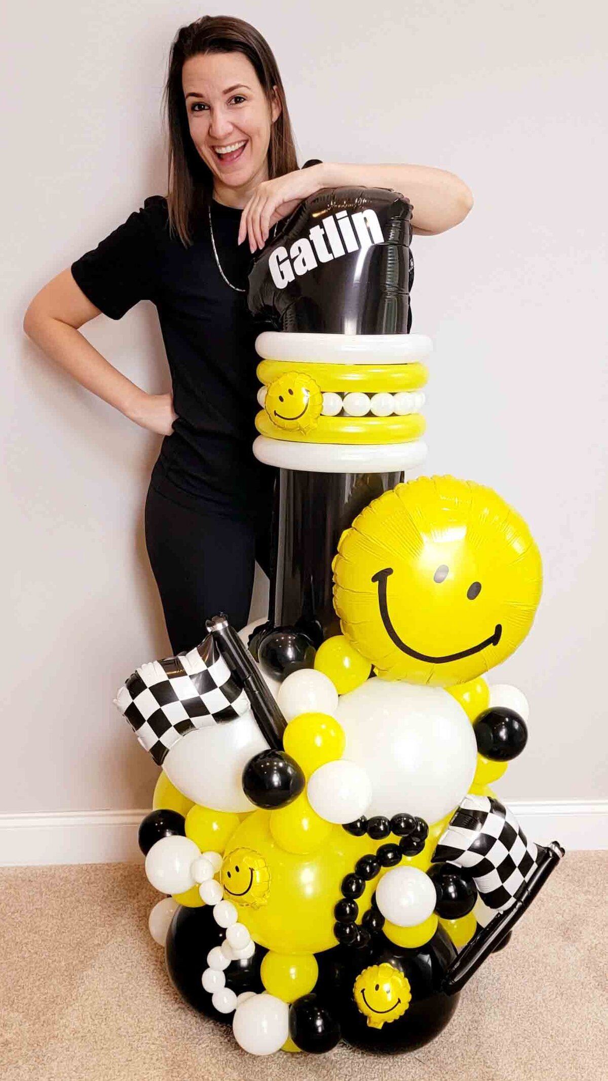 The celebration with Air with Flair Decor's Standard Balloon Bouquet featuring a delightful Yellow and Black Happy Face theme.