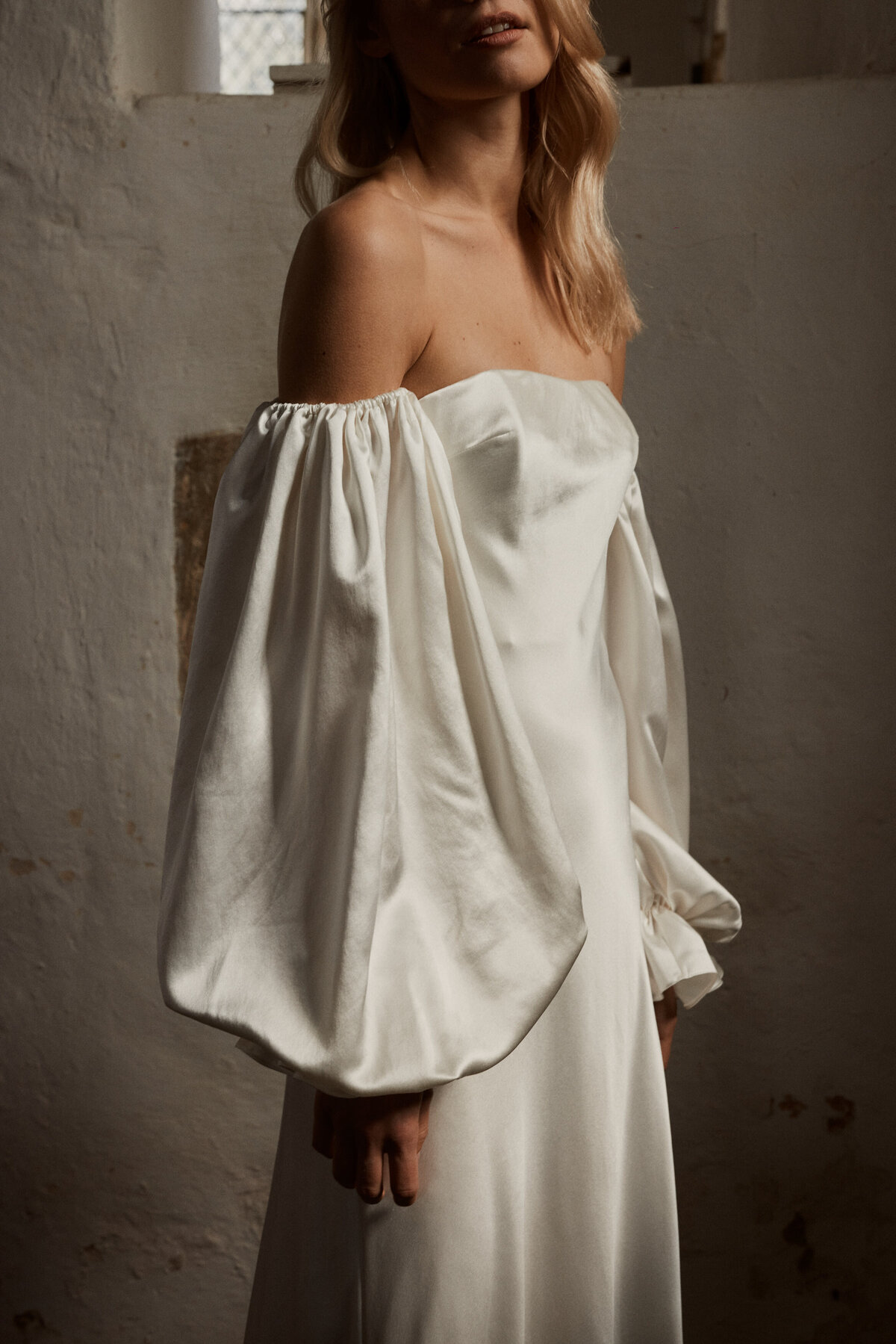 Wedding dress with sleeves, made in silk, worn by bride styled by Luna Bea British handmade wedding gown designer