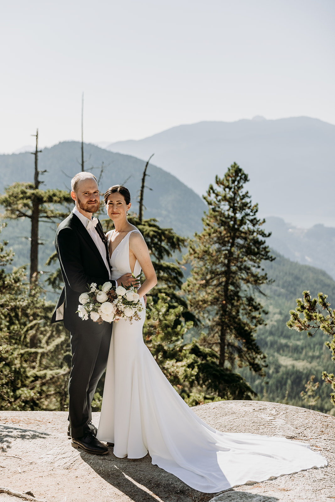 Bride and Groom with custom flowers for Sea to Sky Gondola wedding Squamish - Within the Flowers