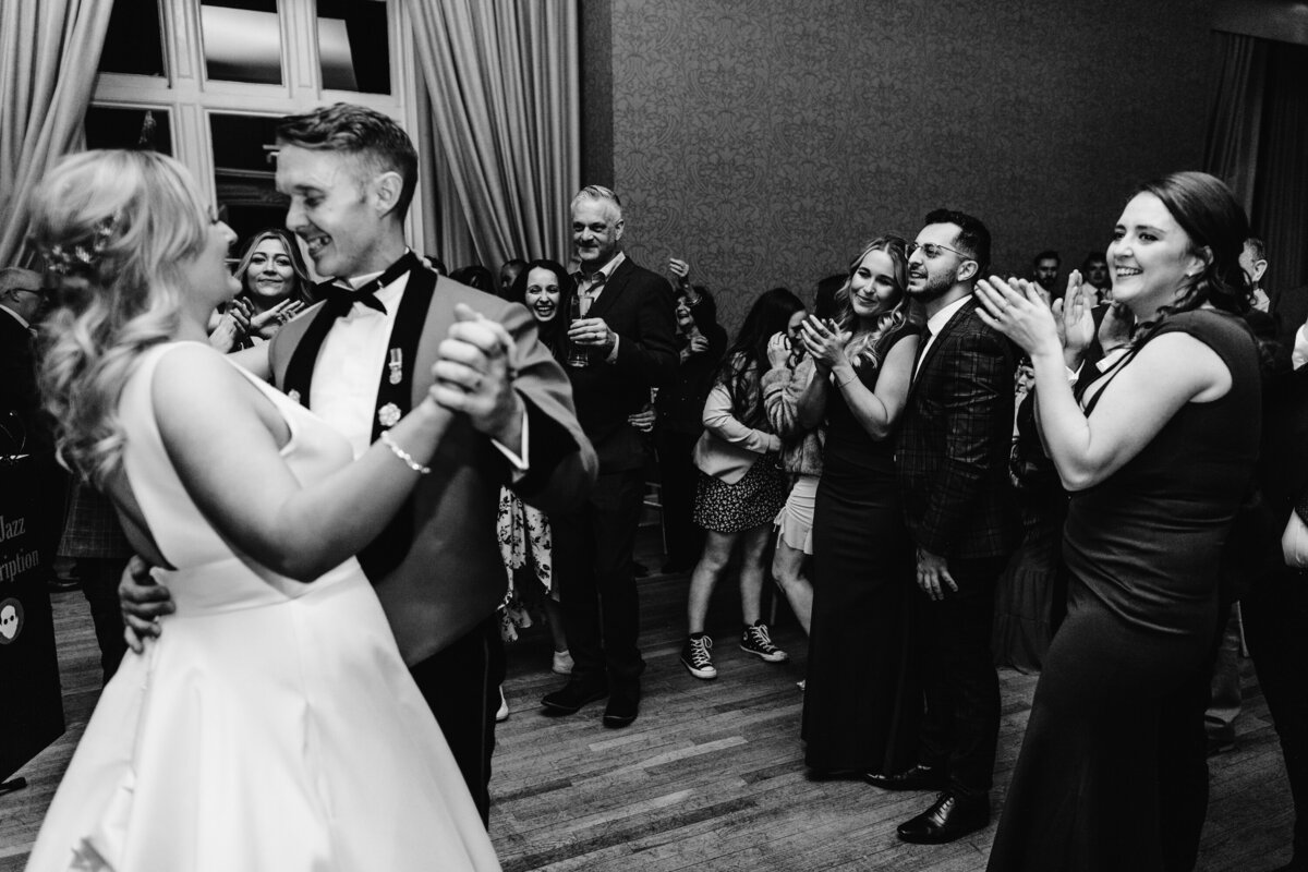 Black and white photo of bride and groom’s first dance