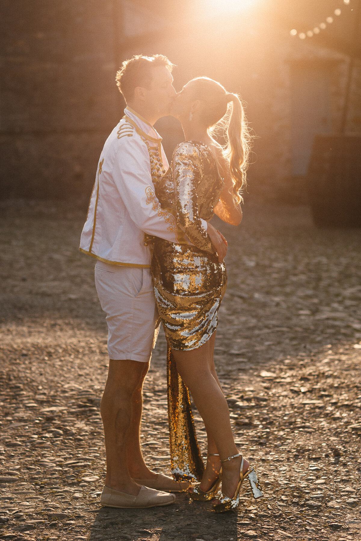 Backlit sunset engagement shoot in Devon girl in gold dress