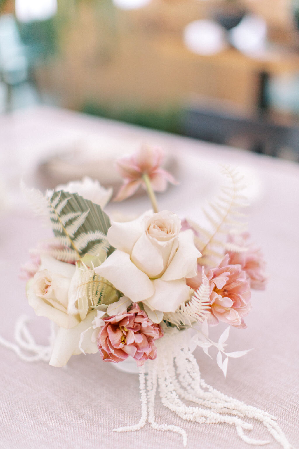 Beautiful wedding decor with pink florals by Meadow & Vine Floral, romantic Alberta wedding florist, featured on the Brontë Bride Vendor Guide.
