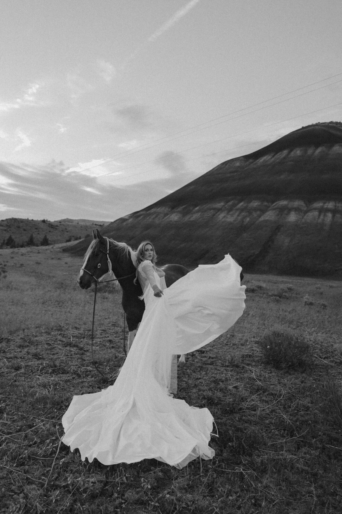 Bride Posing with Horse at Painted Hills | Editorial Oregon Elopement Photographer