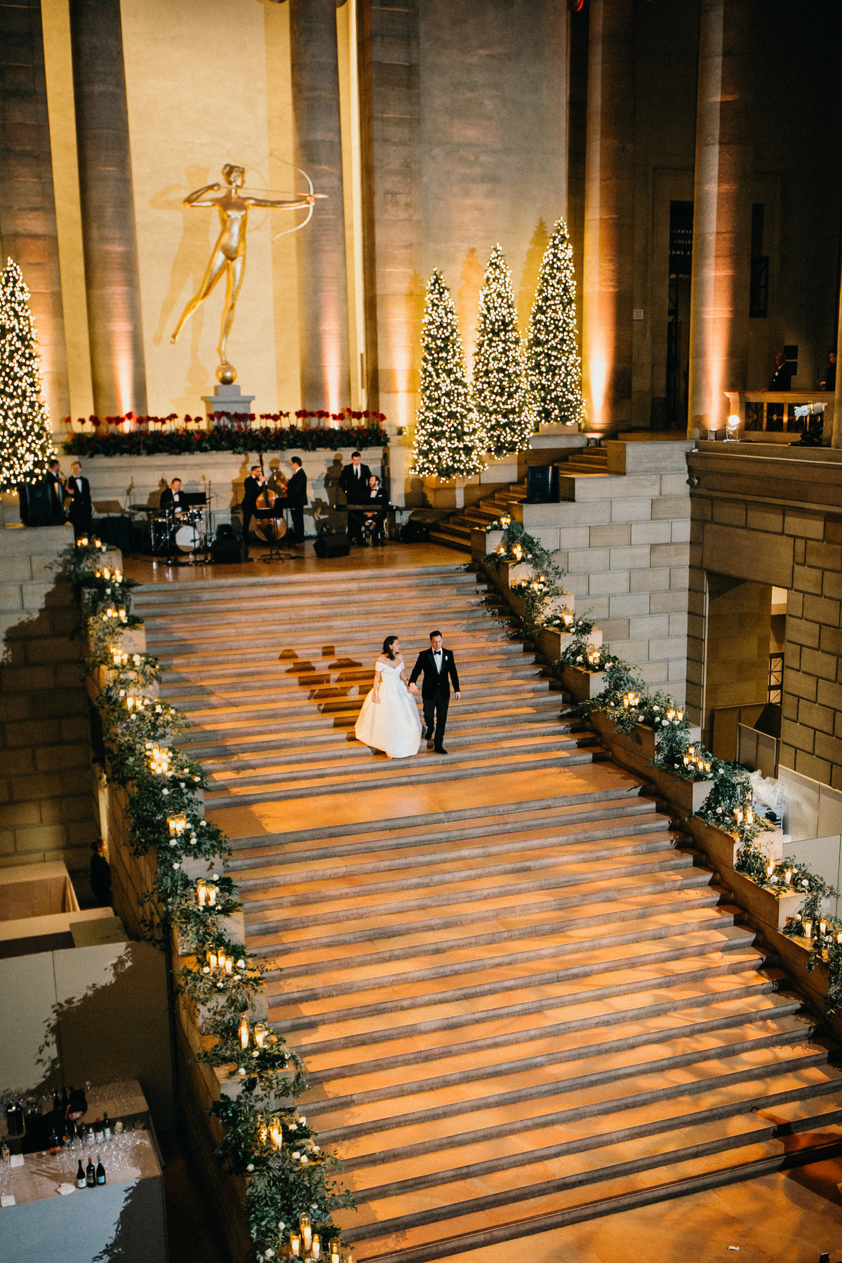 Bride and groom's grand entrance on the Diana Staircase leading down to all their wedding guests.