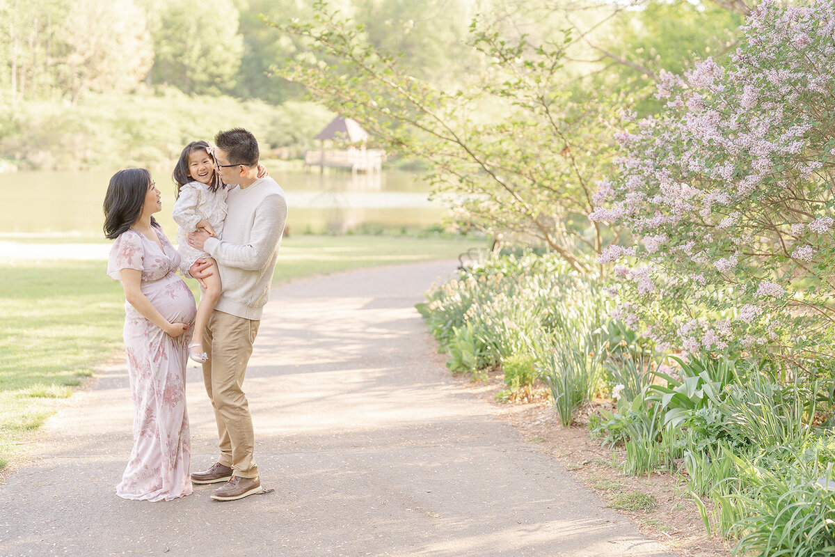 family laughing taken by a Northern Virginia maternity photographer