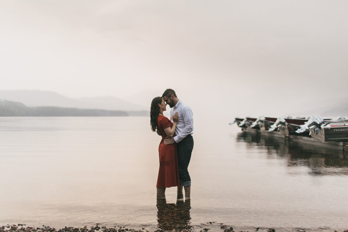 couple holding each other in water