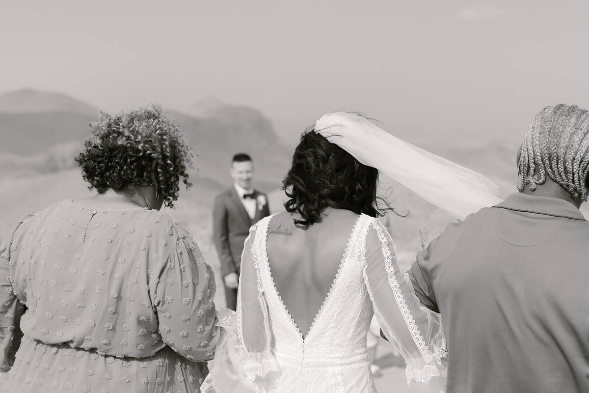 brides parents walk her to her husband at Sotol Vista