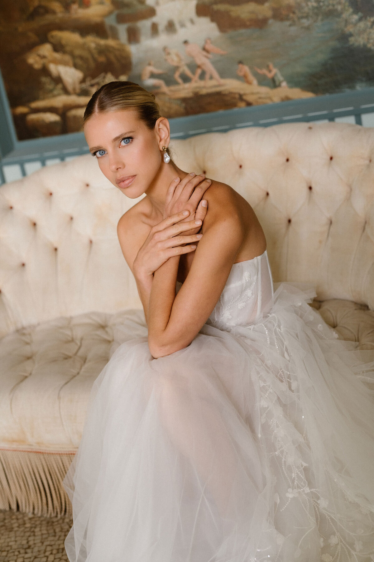 Beautiful bride at a chateau wedding with an alternative wedding cake.