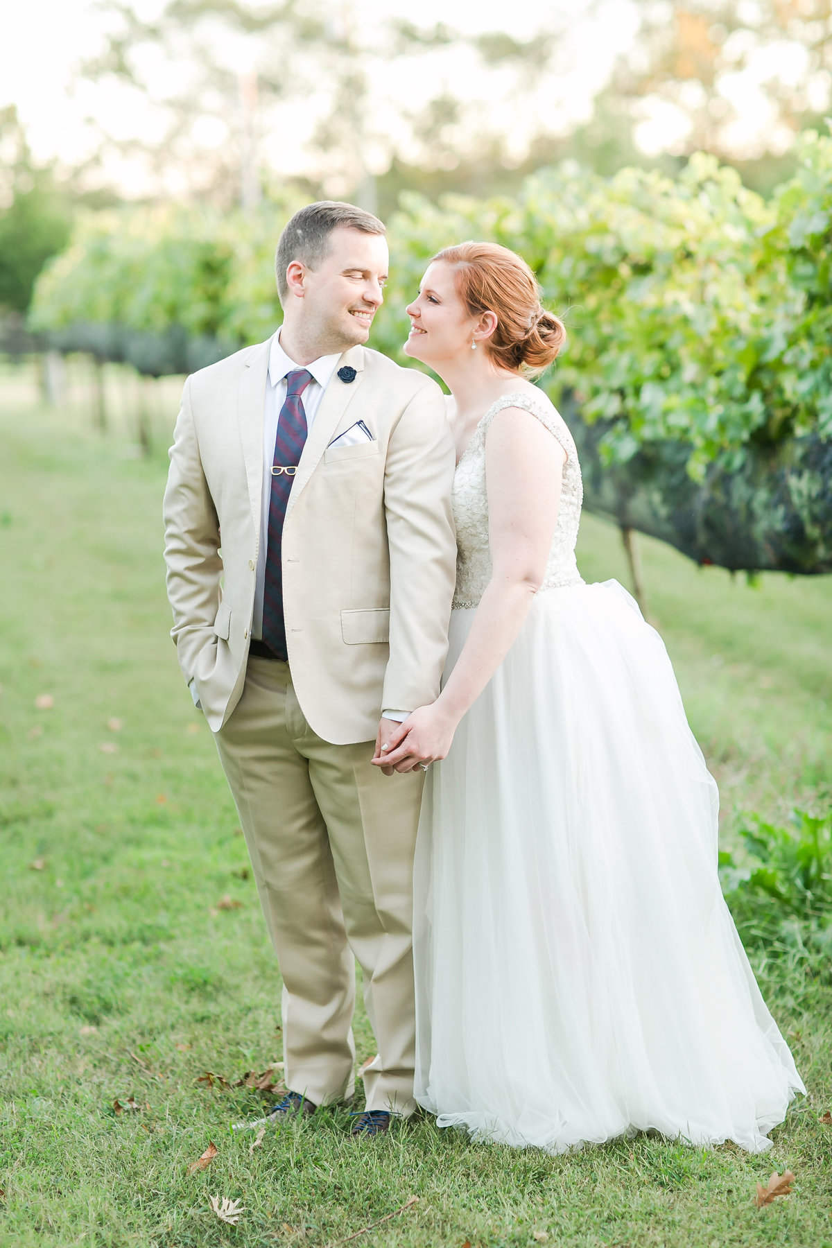 bride and groom smiling