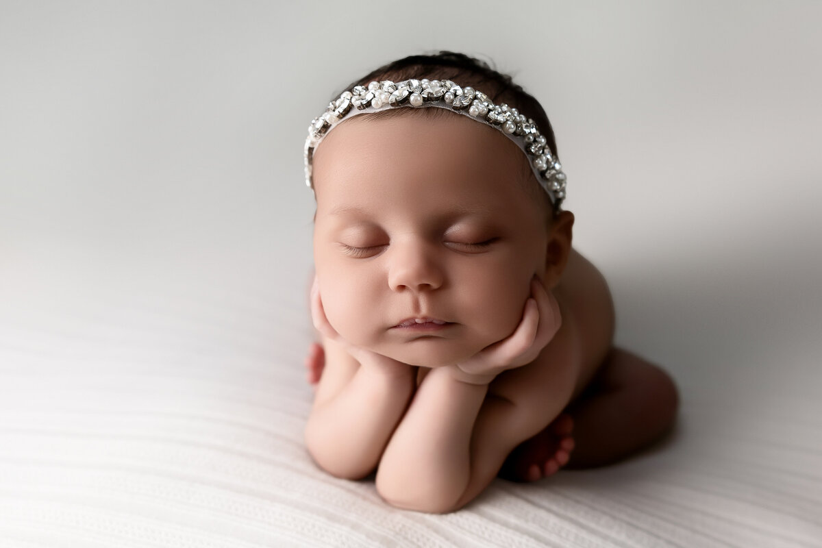 Posed newborn photography. froggy newborn pose. woodland, ca newborn session