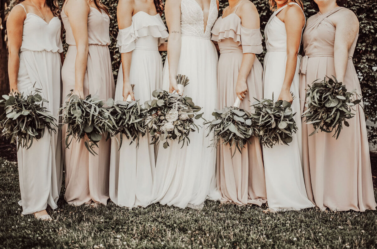 bridesmaids holding bouquets image of neck down