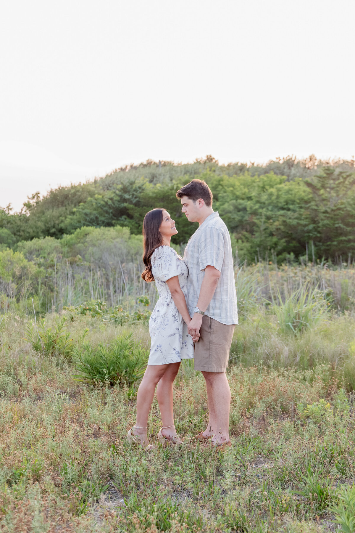 New Jersey Wedding Photographers	Spring Lake, NJ	Beach high grass field	Engagement Session	Summer August	Elegant Luxury Artistic Modern Editorial Light and Airy Natural Chic Stylish Timeless Classy Classic Romantic Couture Fine Art Experienced Professional Love Couples Emotional Genuine Authentic Real Fashion Fairy Tale Dream Lovers Jersey Shore Intimate	Engagement Session Photos Portraits Image 30