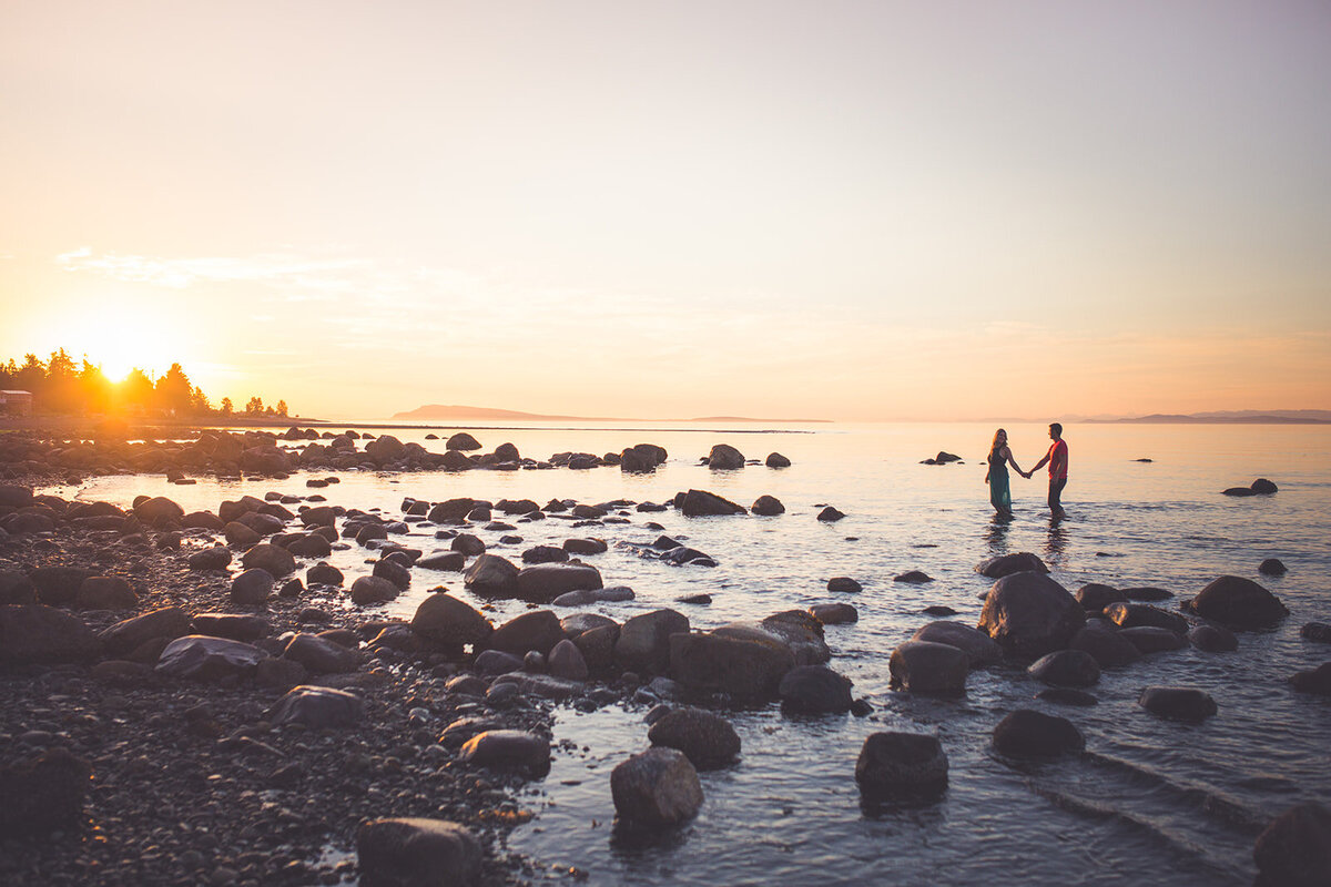 Vancouver Island engagement photos at sunset in the ocean.