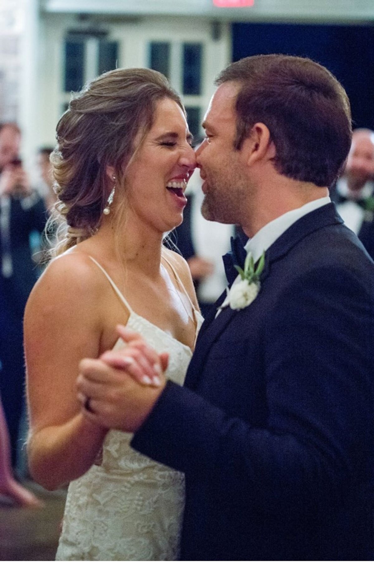 Smiling bride during her first dance at a luxury Italian inspired Chicago North Shore wedding.