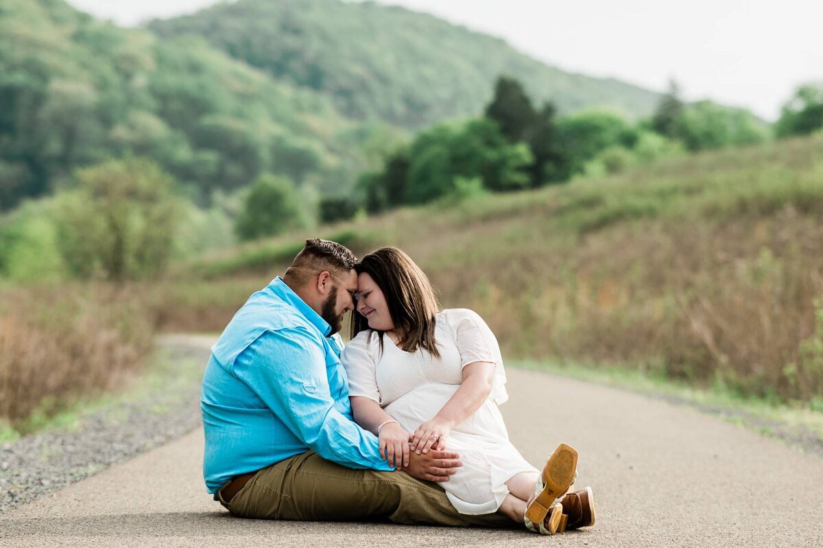 A couple sitting in a path