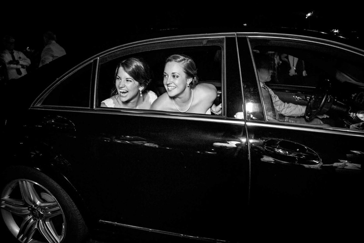 two brides in get-away car