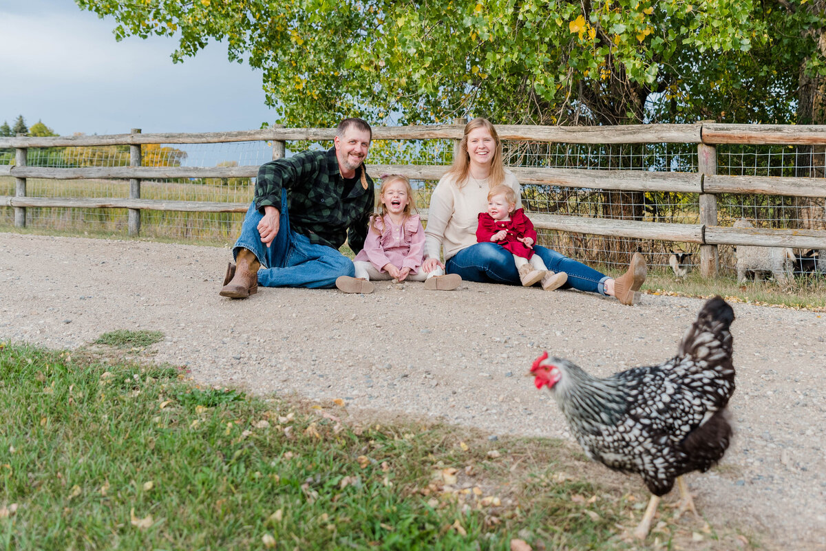 Family Session in Fergus Falls MN when a chicken walked through the picture.