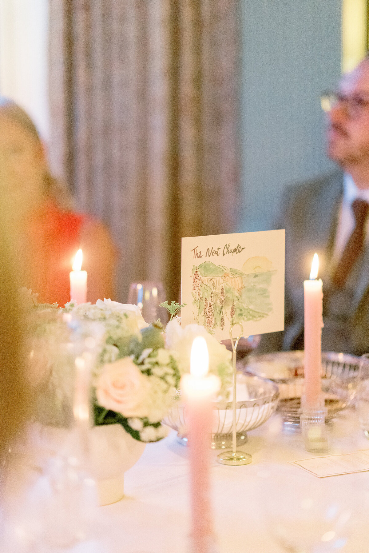 Wedding florals by Lavender and Rose Events and candlelit tables with pink taper candles in Cromlix House country house wedding venue Scotland.