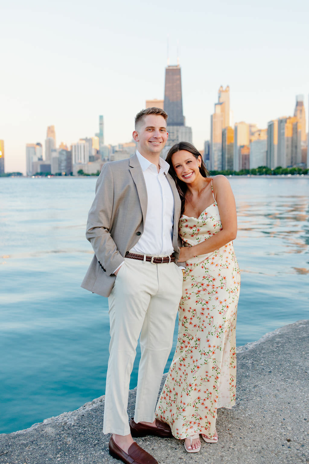 An engagement photography session at The Wrigley Building and North Ave Beach in Chicago, Illinois - 16