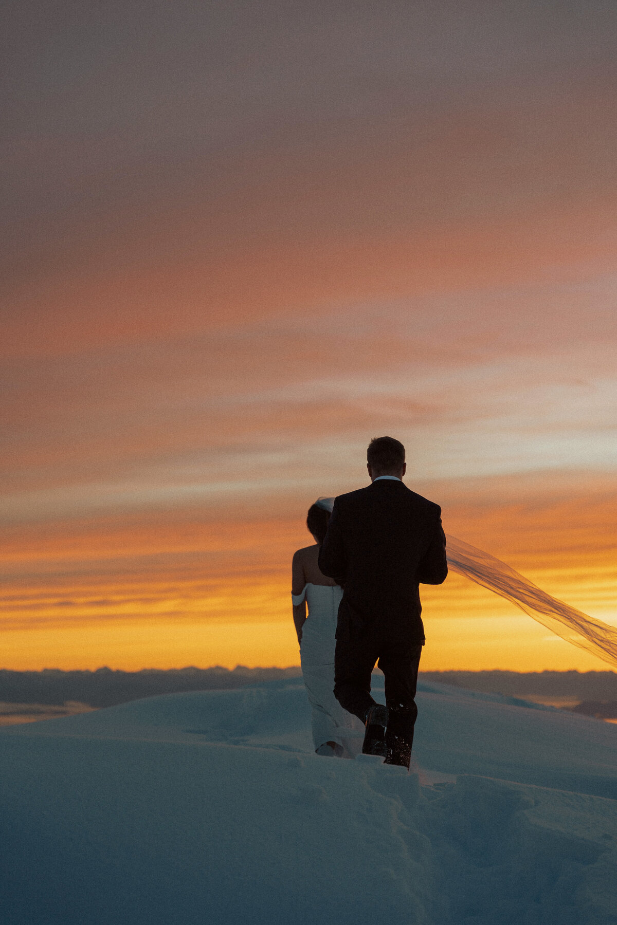 Bride and Groom during their sunrise helicopter and boat elopement in the Comox Valley by Latitude 49 Photography