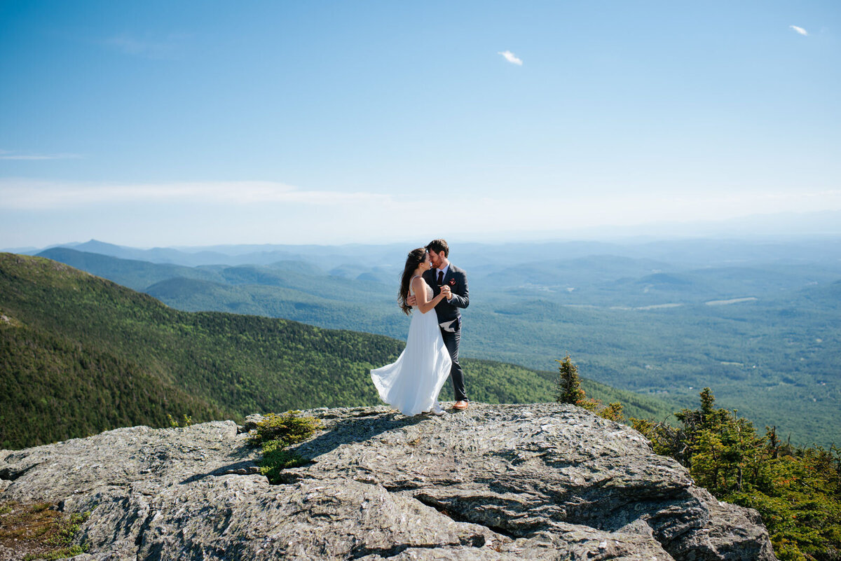 vermont elopement couple dancing on summit of mount mansfield stowe vermont