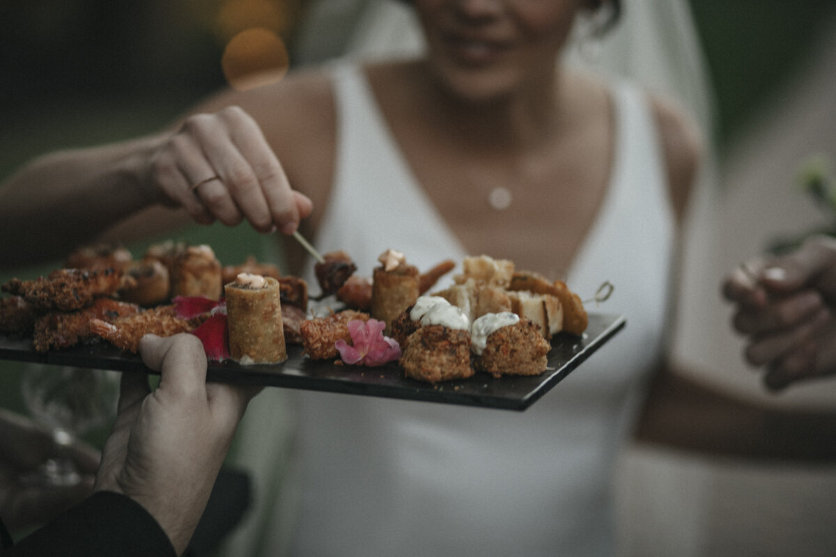 bride-enjoying-passed-hors-d'oeuvres-connecticut-wedding