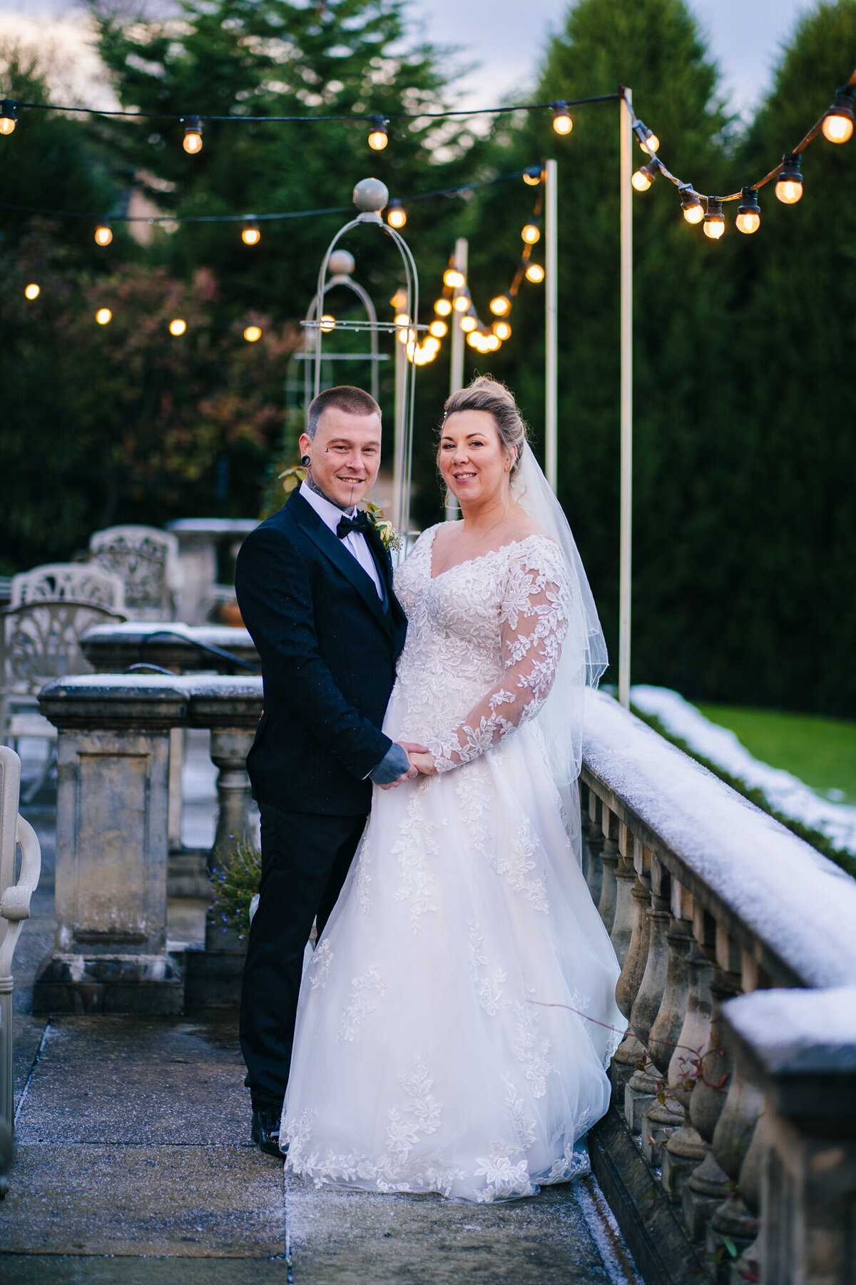 Bride and Groom portrait outside in snow at Ashfield House taken by Wedding Photographer Anthony Horseman