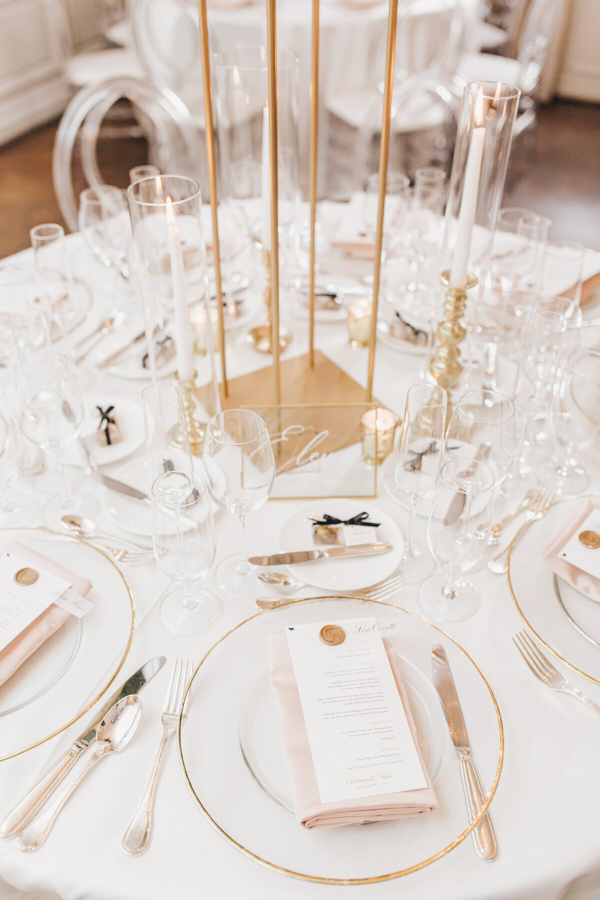 Luxurious wedding dinnerware with crystal plates and gold accents