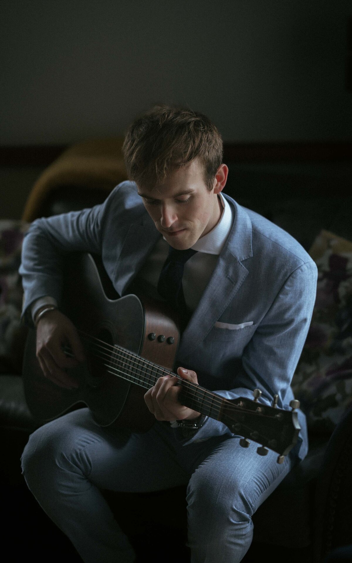 Beautifully captured moments of a groom getting ready, making memories before saying I do.