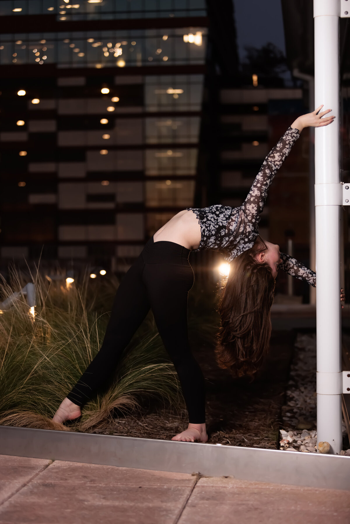 Dance Portraits in Raleigh NC with the lights shining from the Dillon.