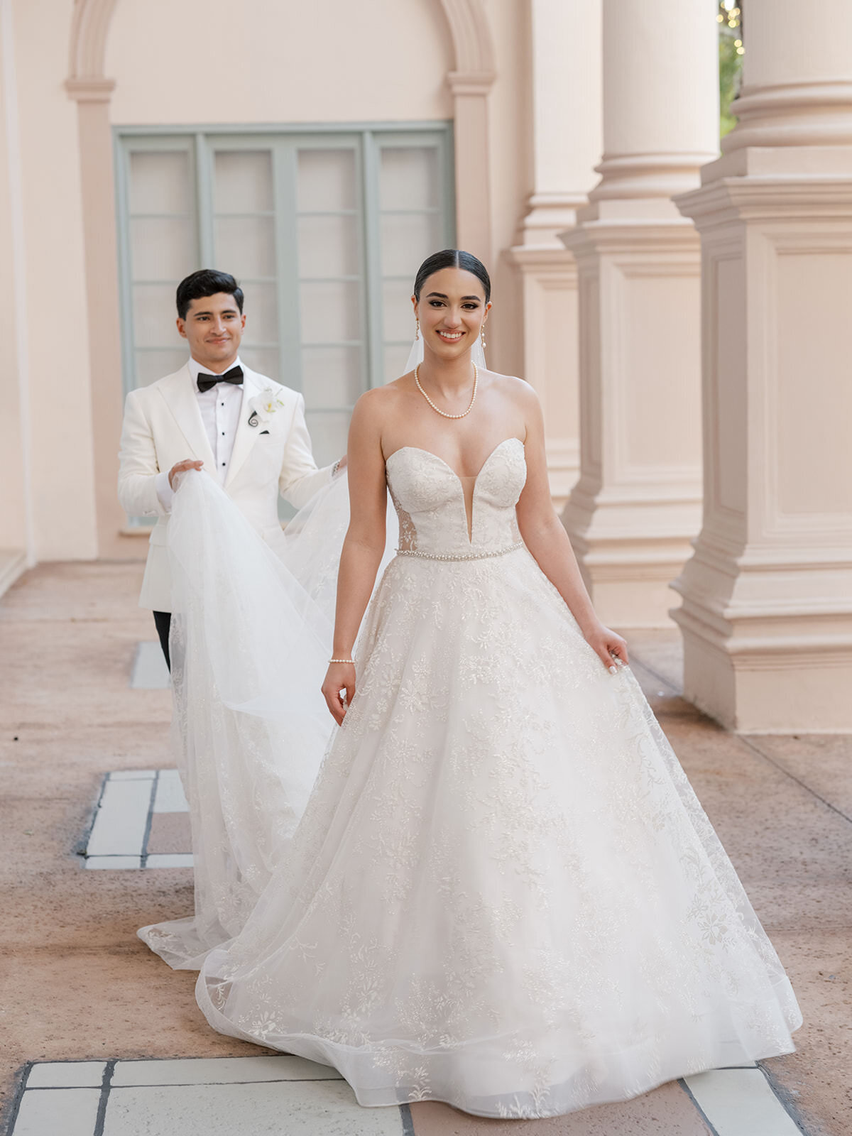 groom-holding-train-coral-gables-2SA-W