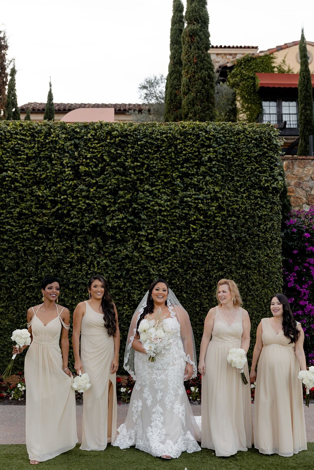Bride with bridesmaids at Bella Collina in Montverde, Fl