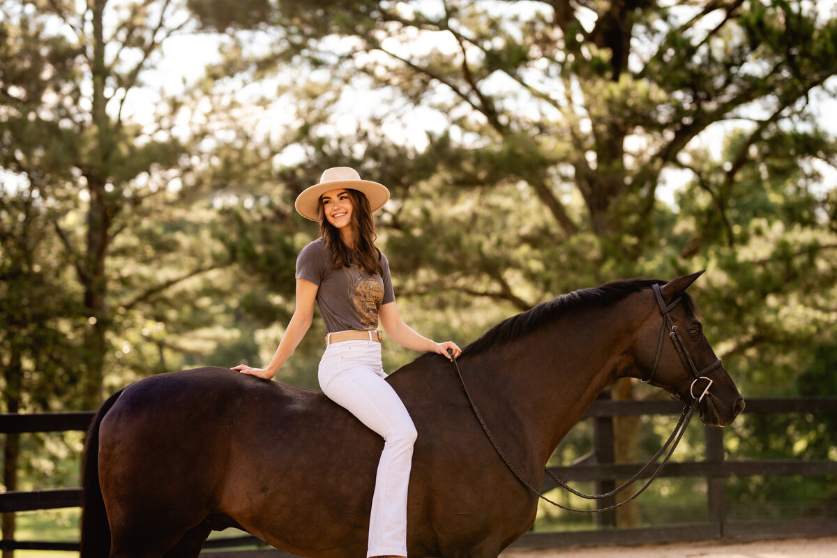 Equestrian has photos taken by pro horse photographer in Alabama at Fox Lake Farm.
