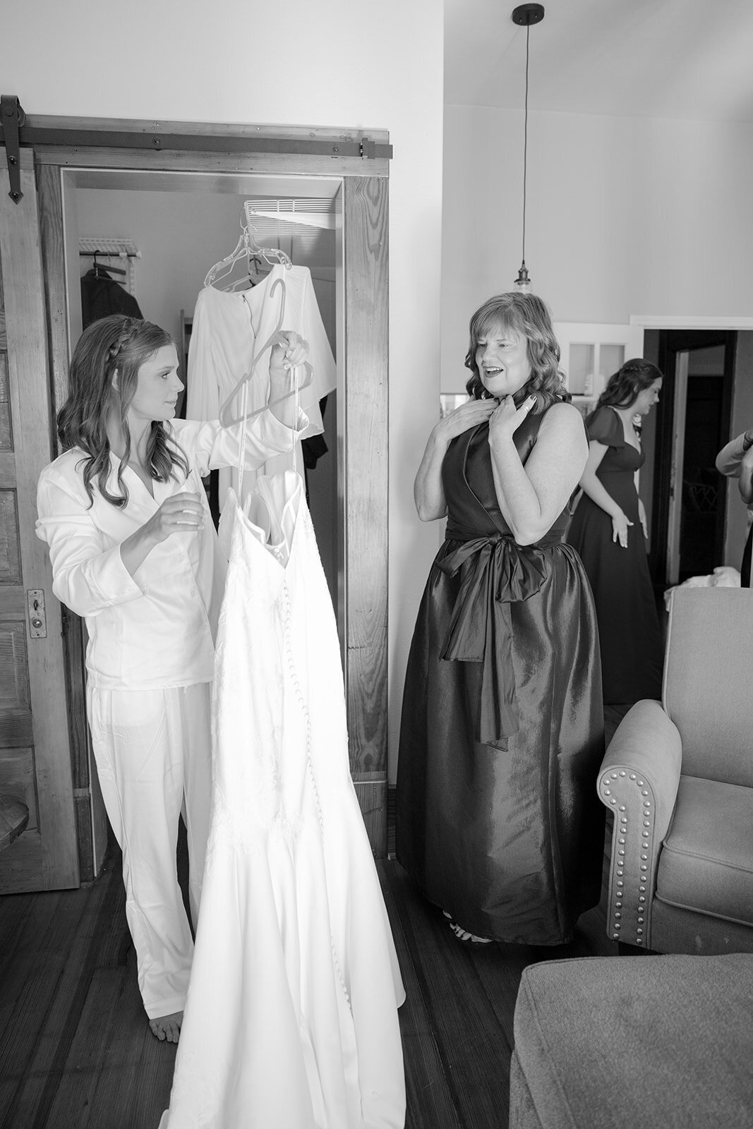 Classic film-style portrait of bride with bridesmaids before the wedding ceremony in San Antonio