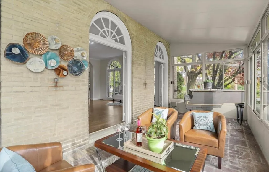 beautiful sunroom with seating area