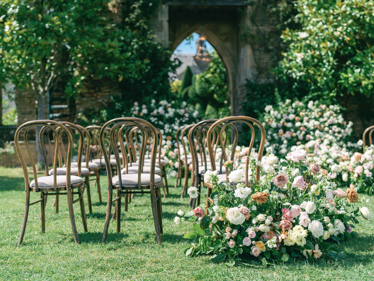 Wedding ceremony outdoors in the garden at Euridge Manor
