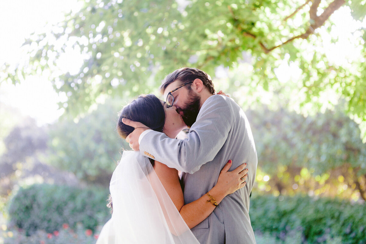 Wedding Ceremony FIrst kiss at the Capitol Park in Sacramento, California