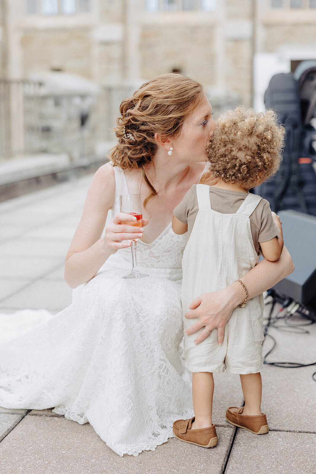 Bride with young child at Cornell University wedding