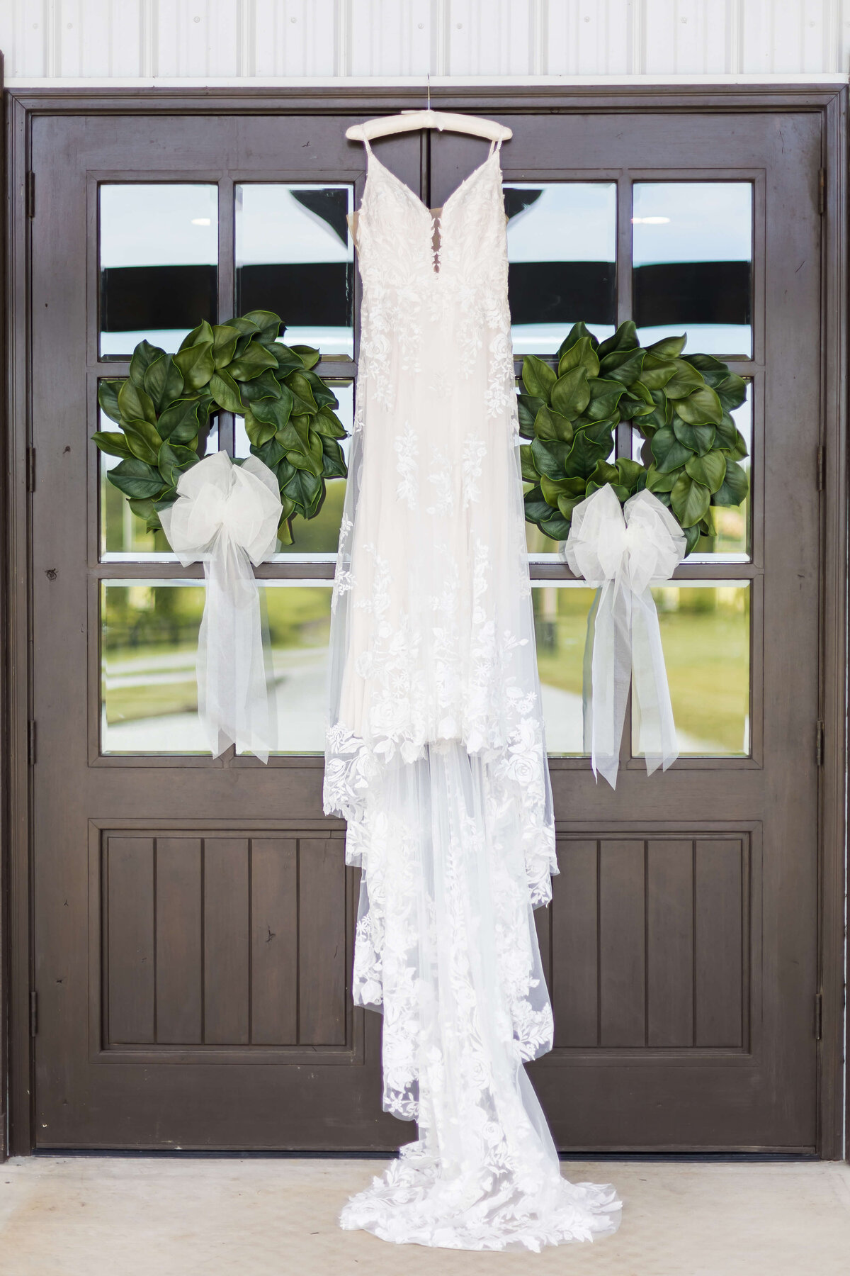 Dress hanging from  door at  The Barn at White Oaks, Murray, Kentucky