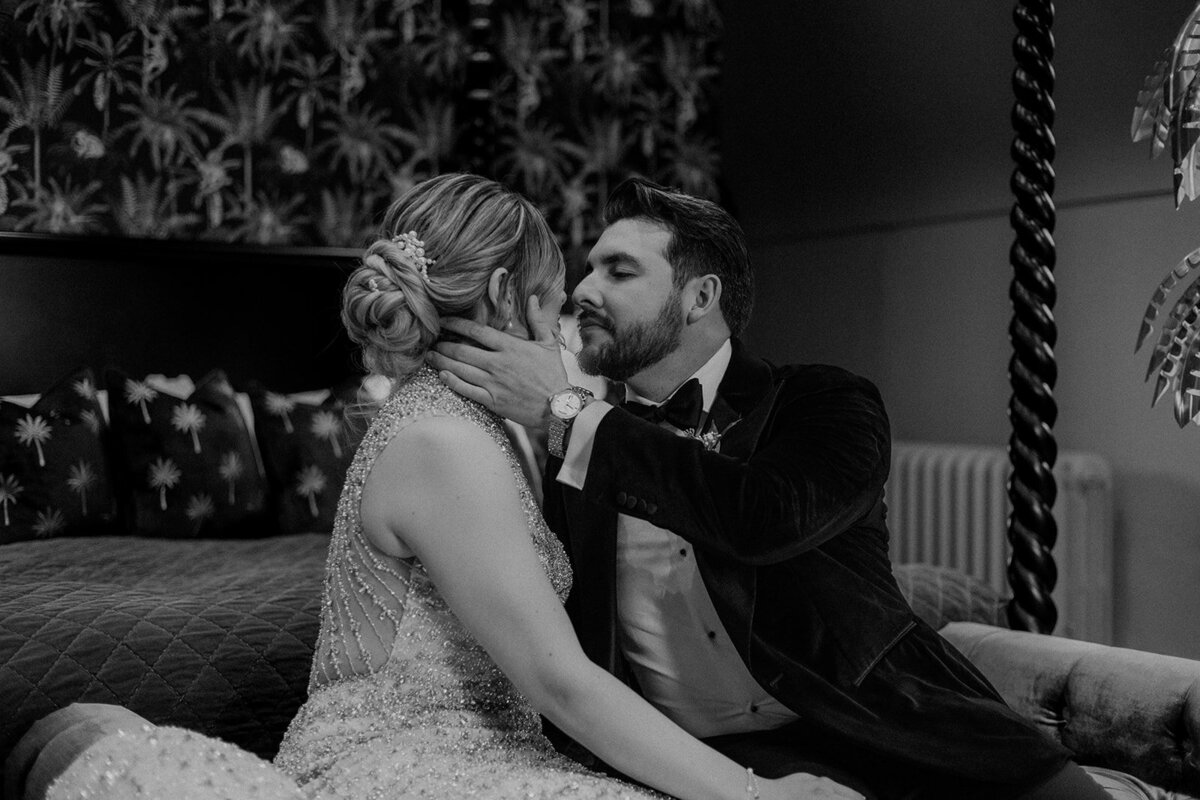 Groom leaning in to kiss his bride