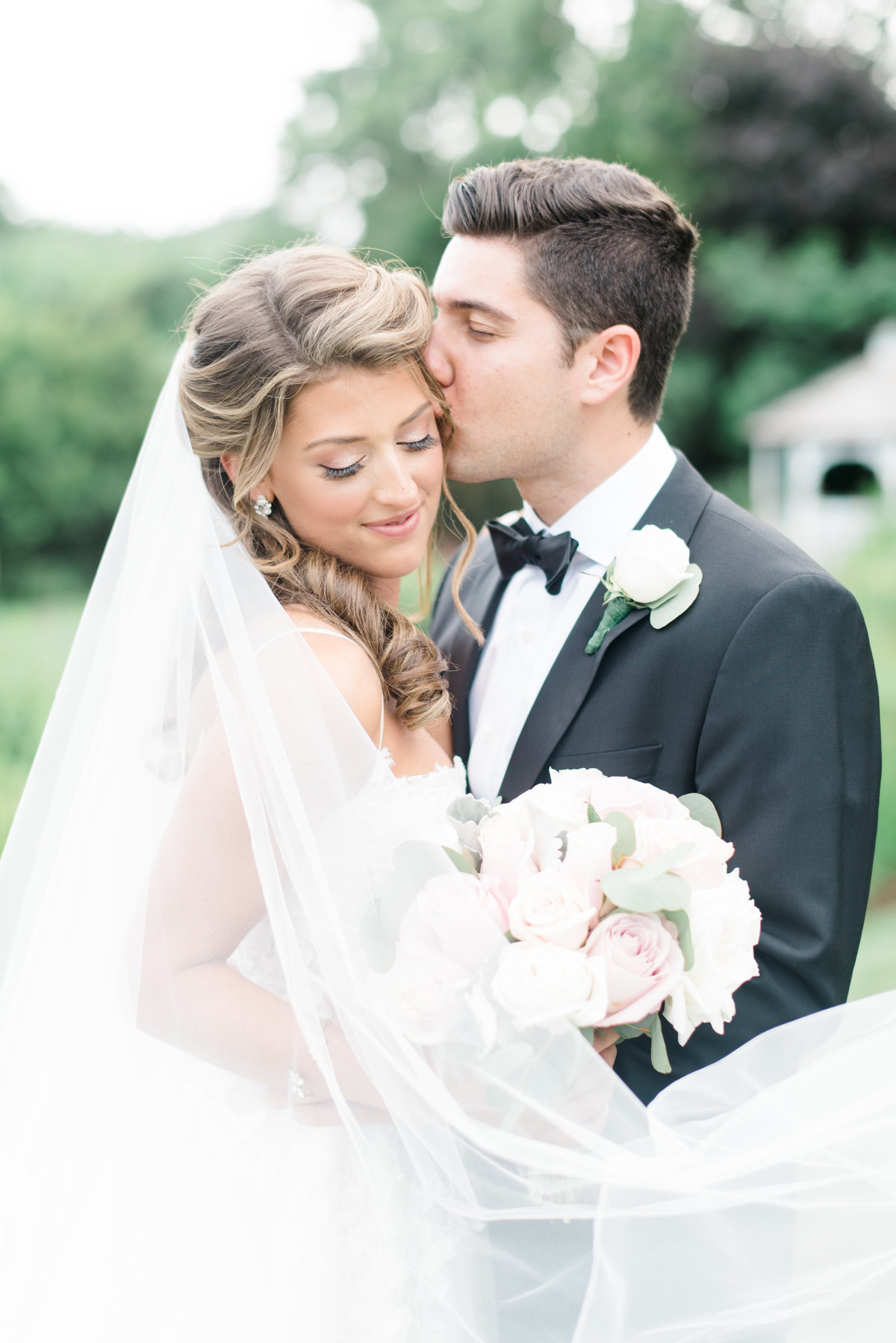 bride-being-kissed-by-groom-wedding-photography-long-island
