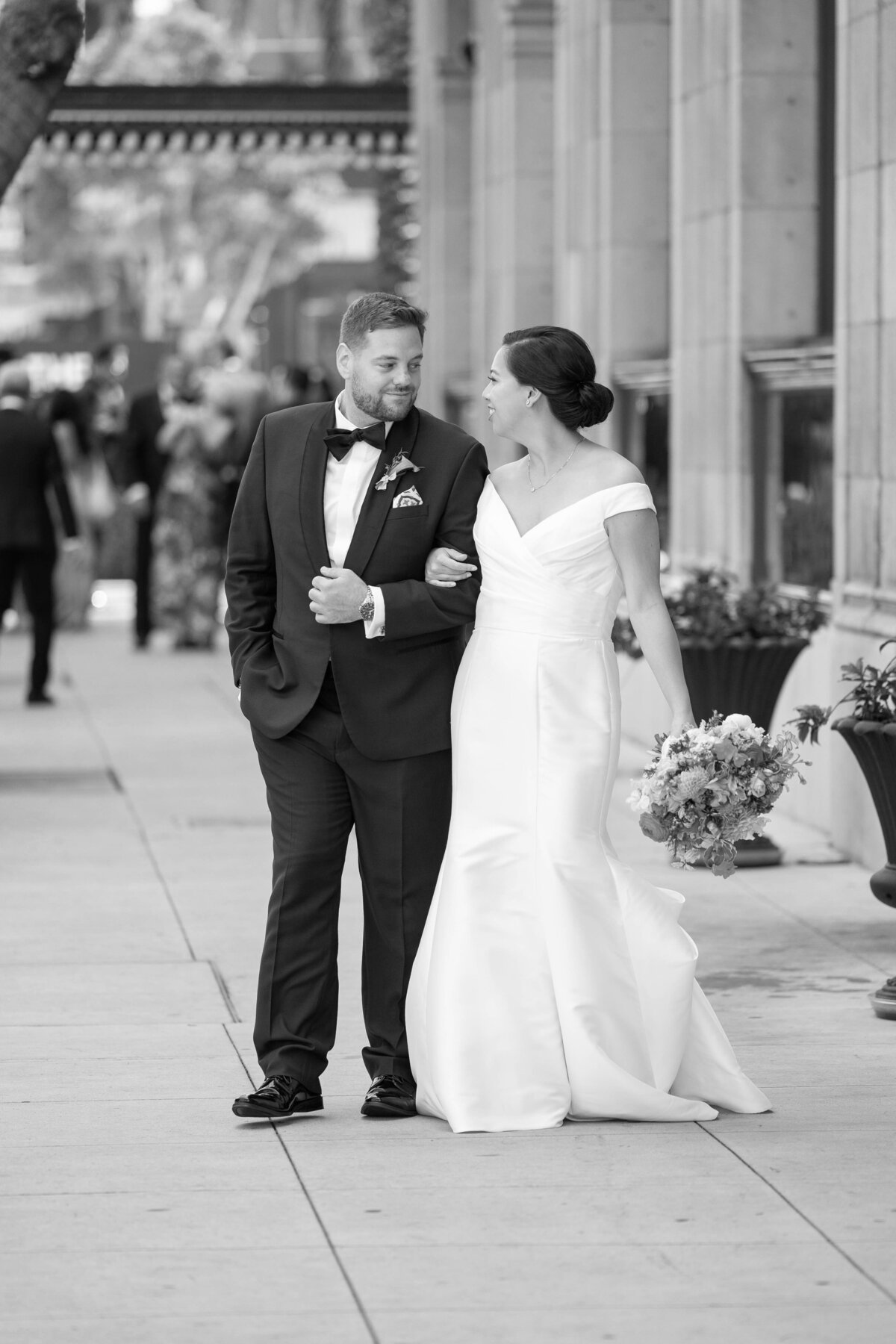 Couple walking outside the Culver Hotel