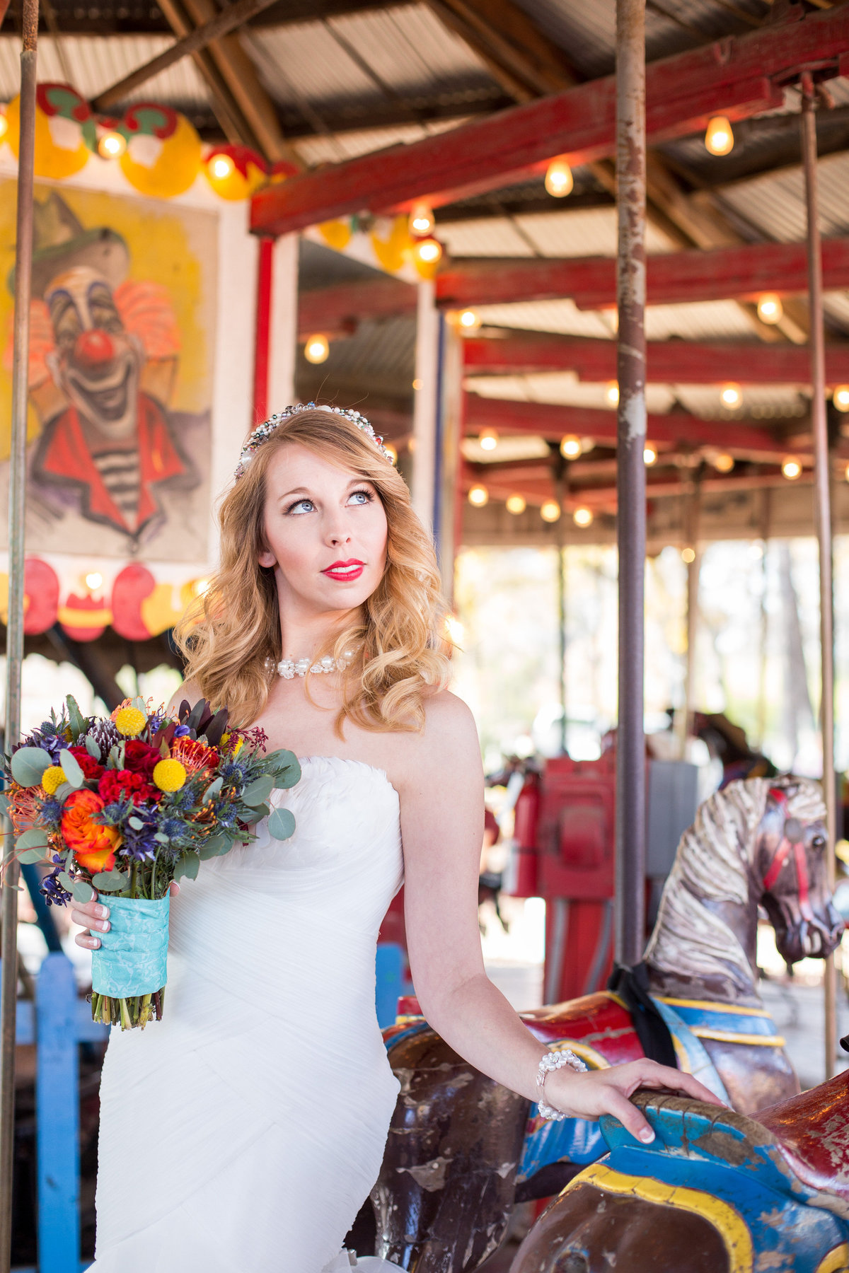 San Antonio wedding photography picture of bride on carousel at Kiddie Park taken by Expose The Heart