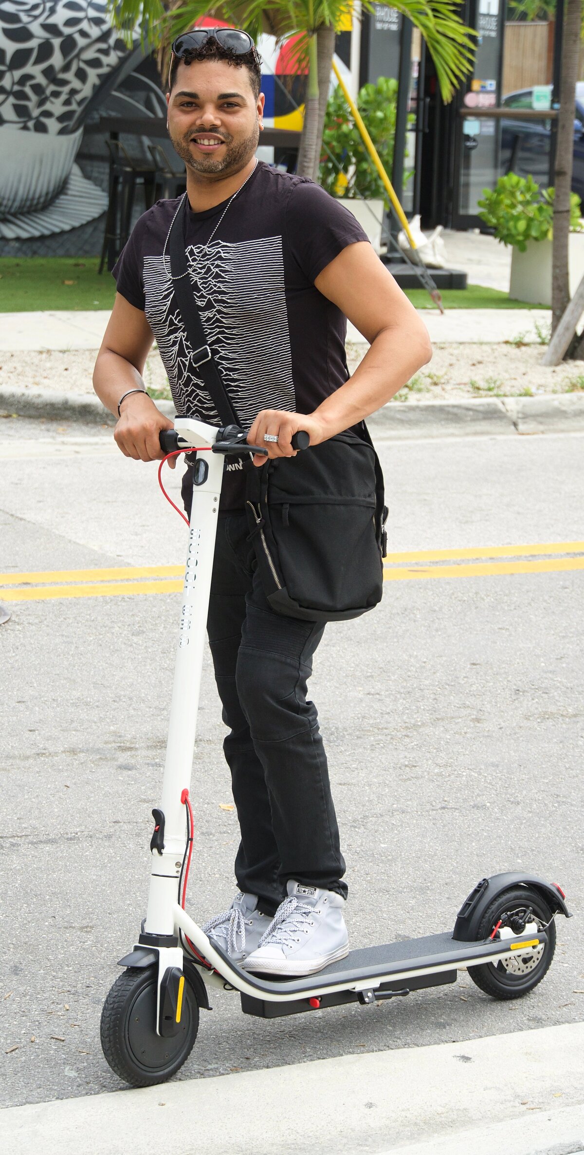 Man on Scoot E-3