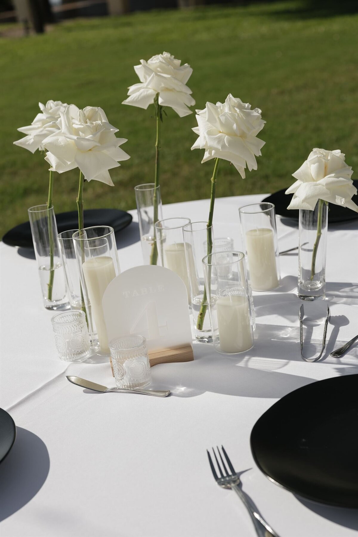 Classy white and black reception table by Day of Details