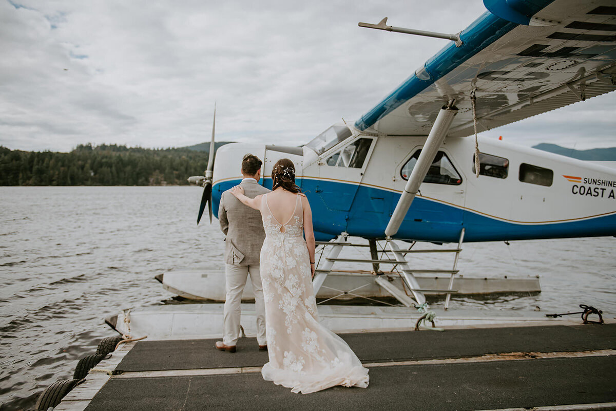 Couple waiting to depart for their waterfall elopement.